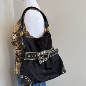The Sak Black Shoulder Bag with Gold-Tone Studs and Crystal Buckle